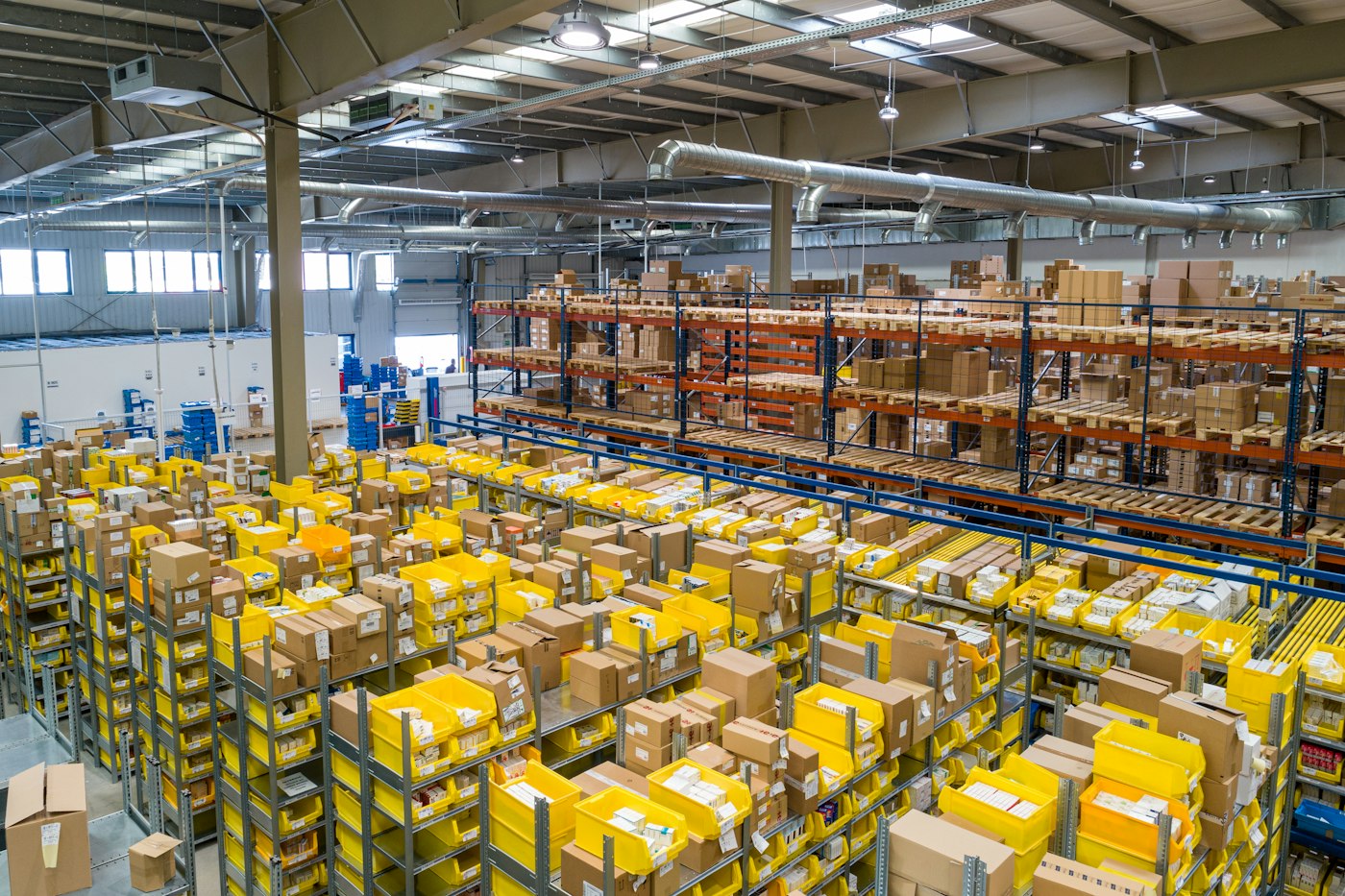 Industrial building interior with high racking
